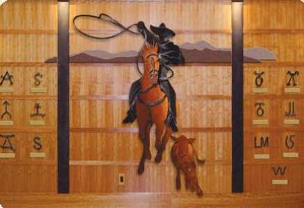 Vaquero on Horseback Amid Cattle Brands